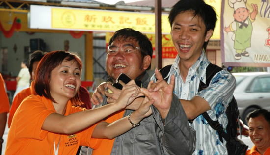 Beng Hock laughing with others