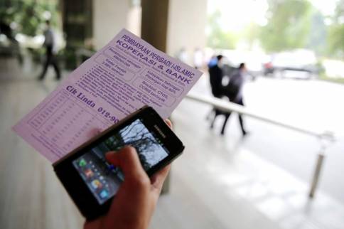 Some civil servants take personal loans for smartphones to keep up with the latest trend.