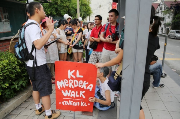 RakanKL has been conducting guided heritage walks not just  to raise awareness of heritage conservation but to defend heritage areas from the heavy construction currently underway. – Picture by Choo Choy May