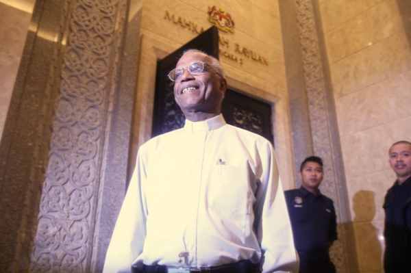 Father Lawrence arrives for a court hearing at the Palace of Justice in Putrajaya, August 22, 2013.